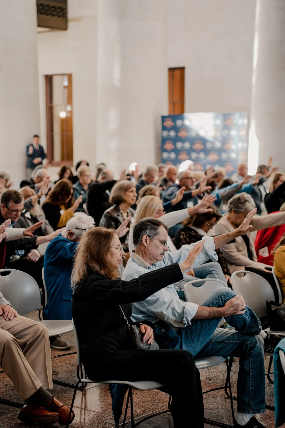 Praying together, seated in the atrium